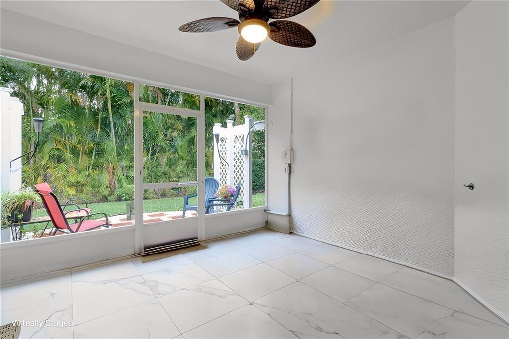 115 Briarcliff Circle Sebastian, FL 32958 - Photo 15 of 26 a view of an empty room with wooden floor and a window