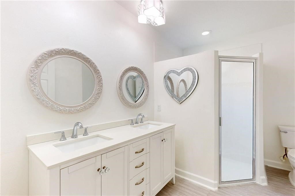 115 Briarcliff Circle Sebastian, FL 32958 - Photo 20 of 26 a bathroom with a sink and a mirror