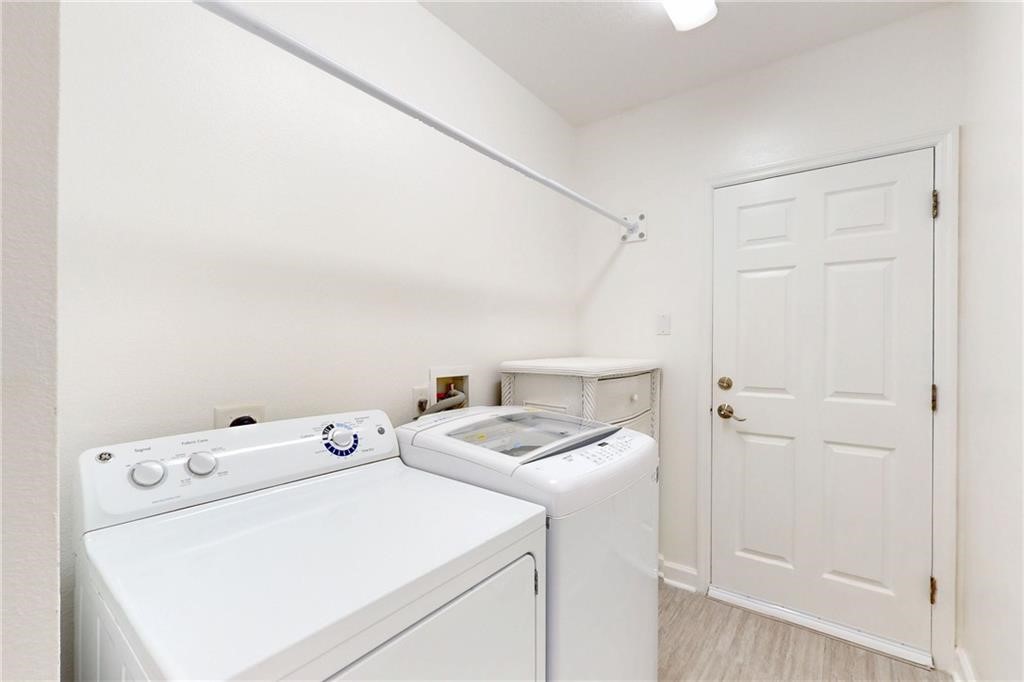 115 Briarcliff Circle Sebastian, FL 32958 - Photo 10 of 26 a utility room with dryer and washer