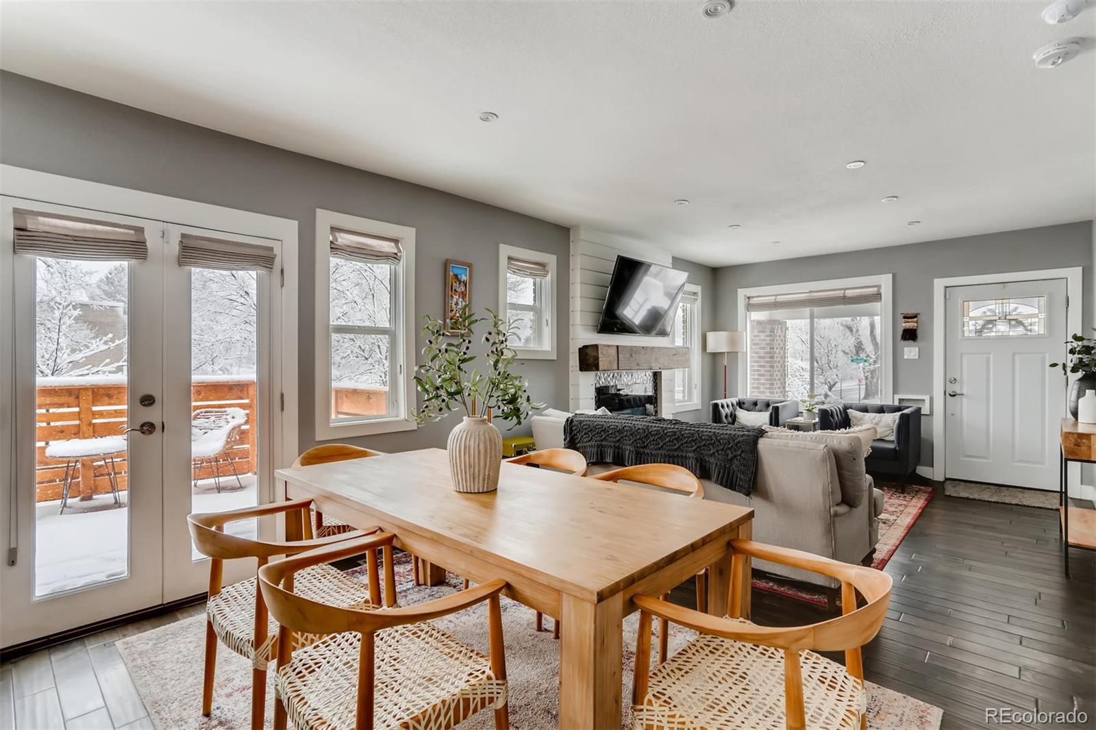 3510 Elizabeth Street Denver, CO 80205 - Photo 11 of 39 a living room with furniture a wooden floor and a window