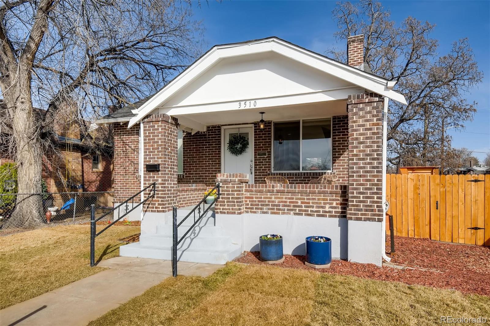 3510 Elizabeth Street Denver, CO 80205 - Photo 3 of 39 a view of entrance gate of the house