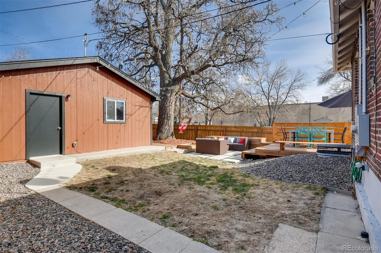 3510 Elizabeth Street Denver, CO 80205 - Photo 37 of 39 a view of a house with a yard