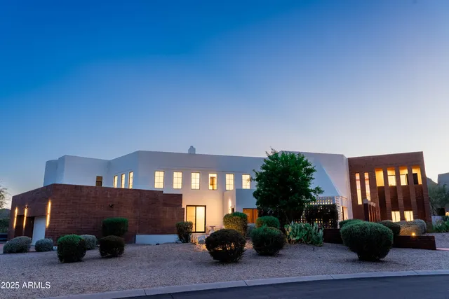 a house view with a garden space