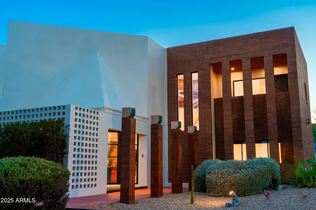 a view of a building with a street