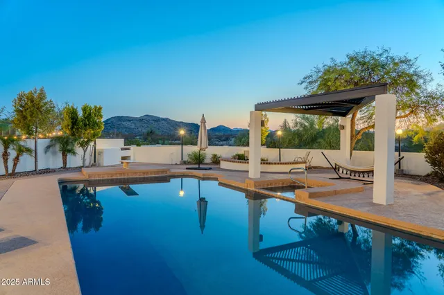 a view of living room kitchen with furniture and outdoor seating