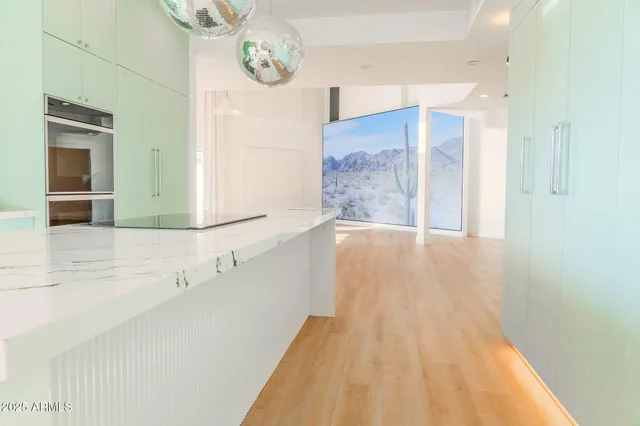 a view of a bathroom with a bathtub and a window