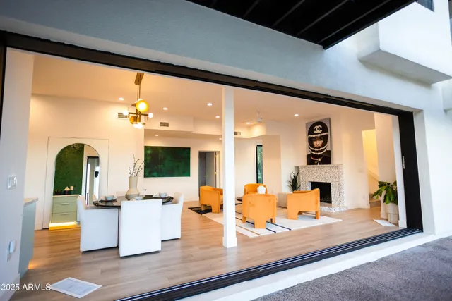 a bathroom with a sink a mirror and shower