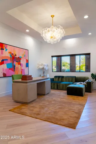 a living room with furniture and a table