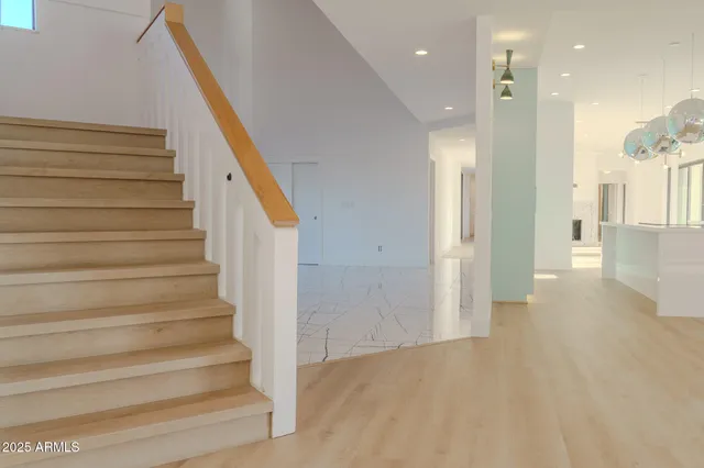 a view of a patio with furniture and a mountain