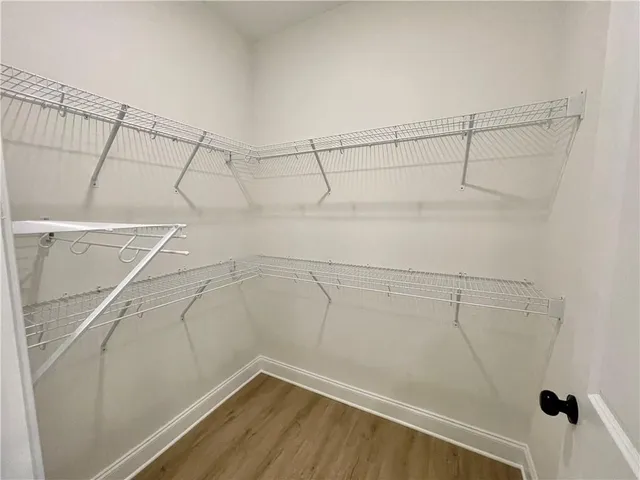 a view of a room with racks on the wall