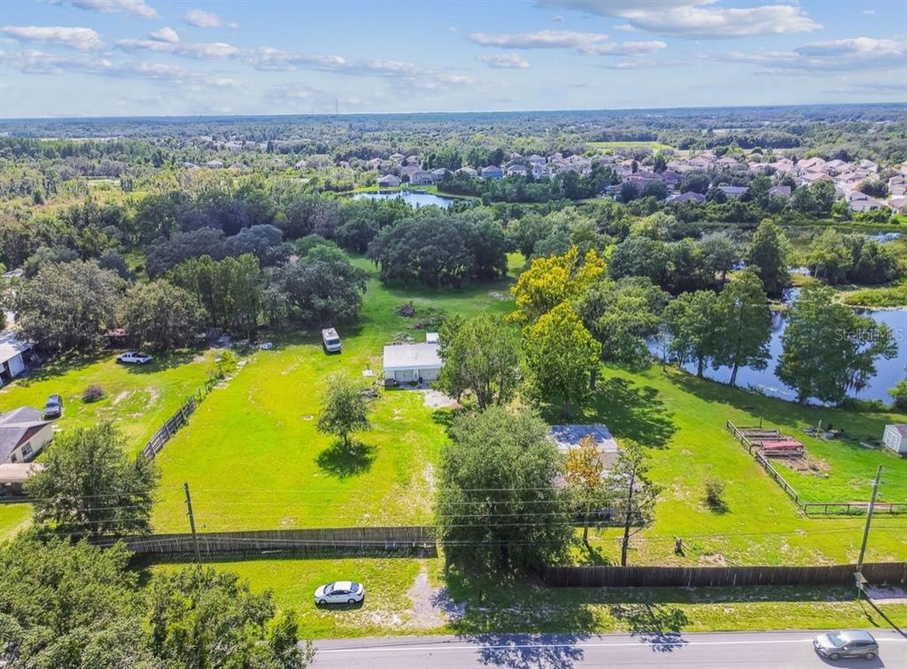 12321 Shady Hills Road Spring Hill, FL 34610 - Photo 10 of 30 an aerial view of a residential houses with outdoor space and swimming pool