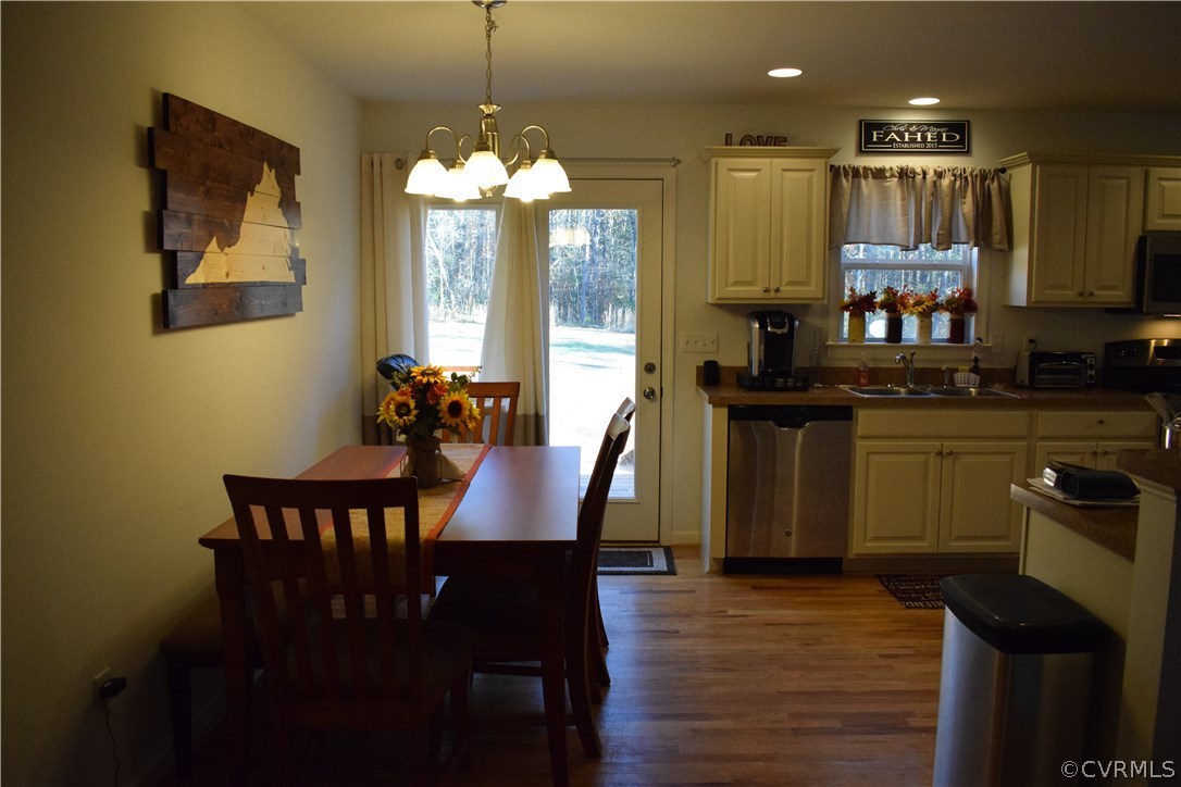 5185 Broad St Road Louisa, VA 23093 - Photo 5 of 24 a view of a dining room with furniture window and wooden floor