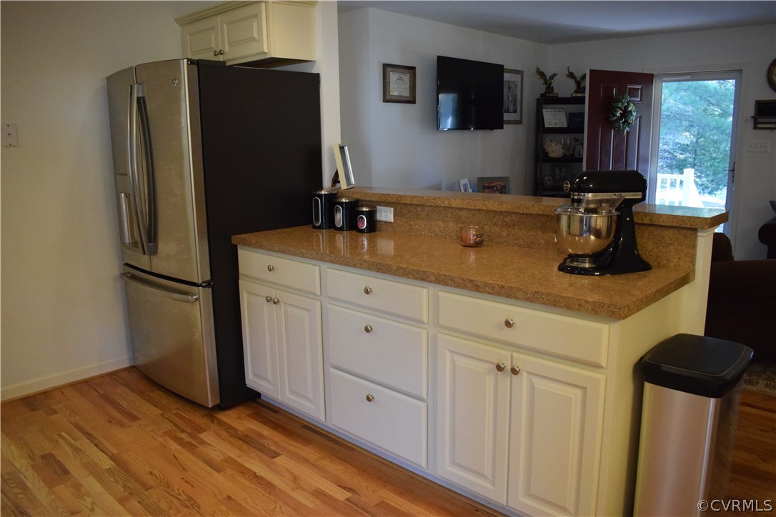 5185 Broad St Road Louisa, VA 23093 - Photo 9 of 24 a kitchen with stainless steel appliances a refrigerator sink and cabinets