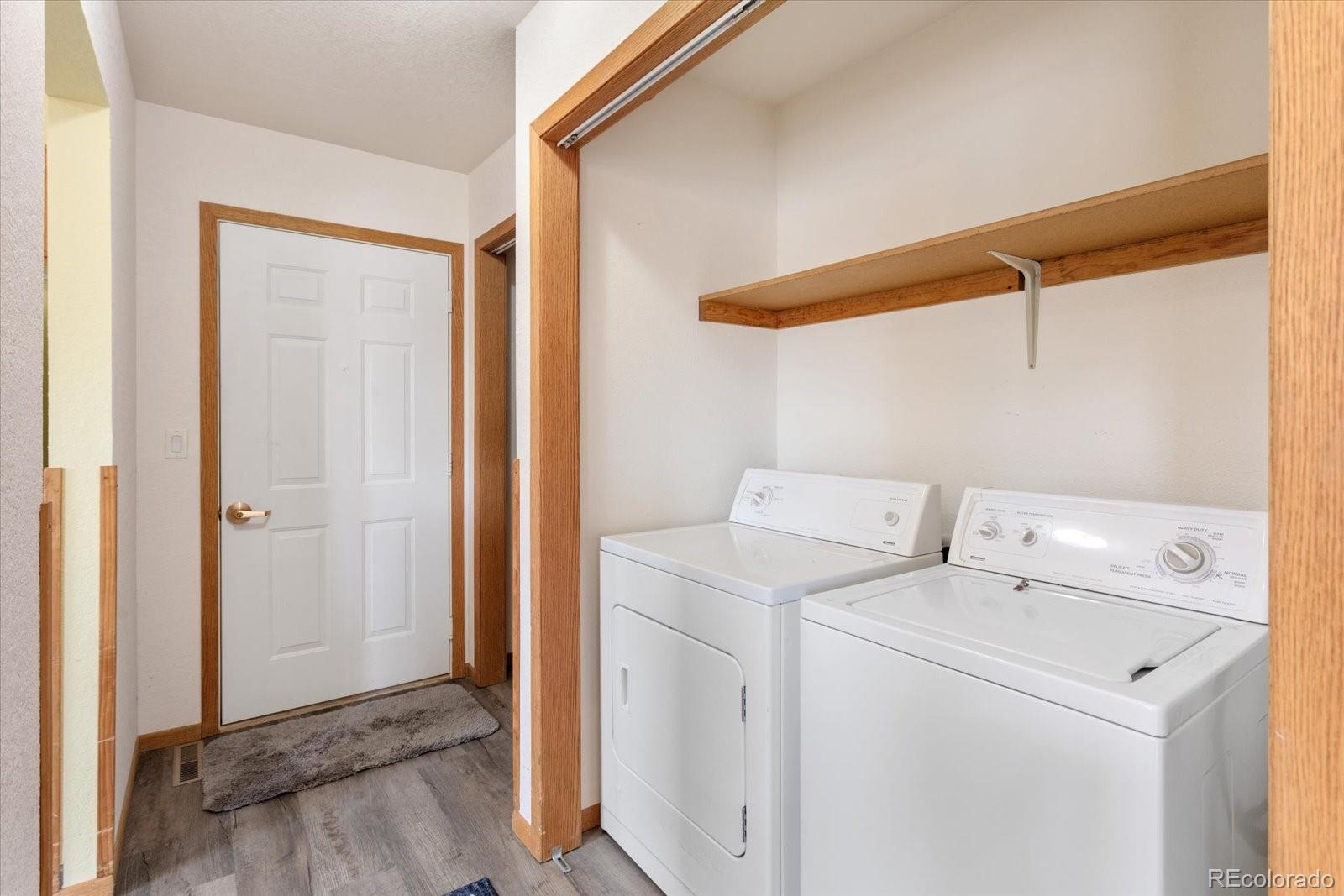 7401 County Road 141 Salida, CO 81201 - Photo 30 of 45 a view of storage and utility room with washer and dryer