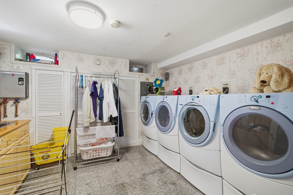 6 Elba Street Brookline, MA 02446 - Photo 32 of 34 a utility room with dryer and washer