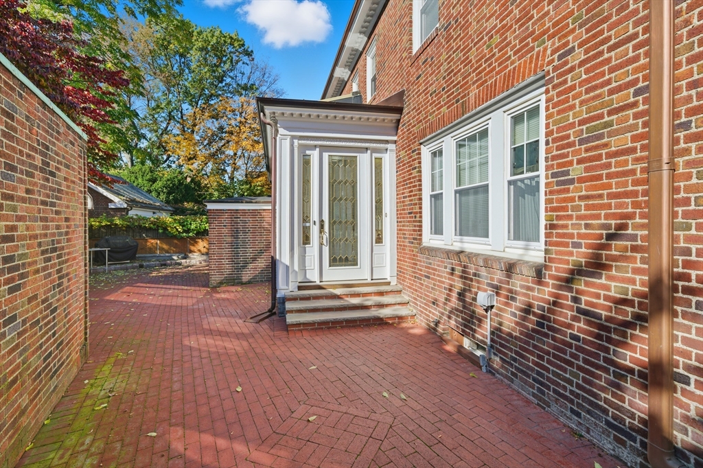 6 Elba Street Brookline, MA 02446 - Photo 34 of 34 a view of house with backyard