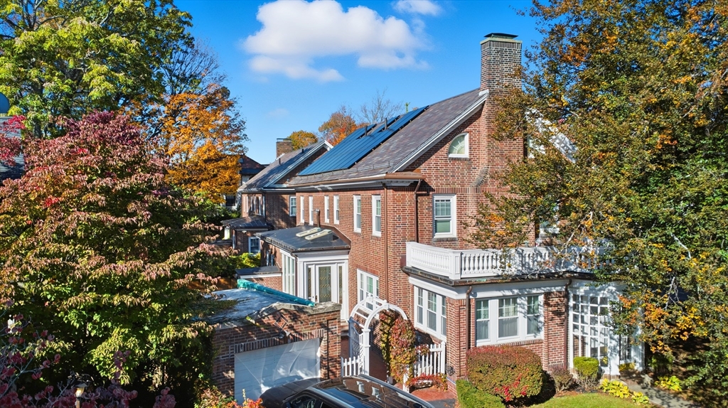 6 Elba Street Brookline, MA 02446 - Photo 4 of 34 a view of a building with a tree