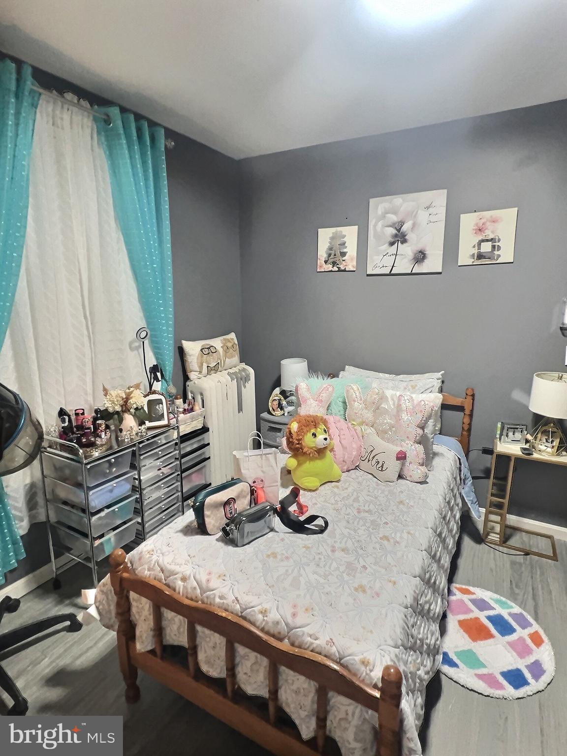 725 Pear Street Reading, PA 19601 - Photo 10 of 12 a bed room with furniture and a window