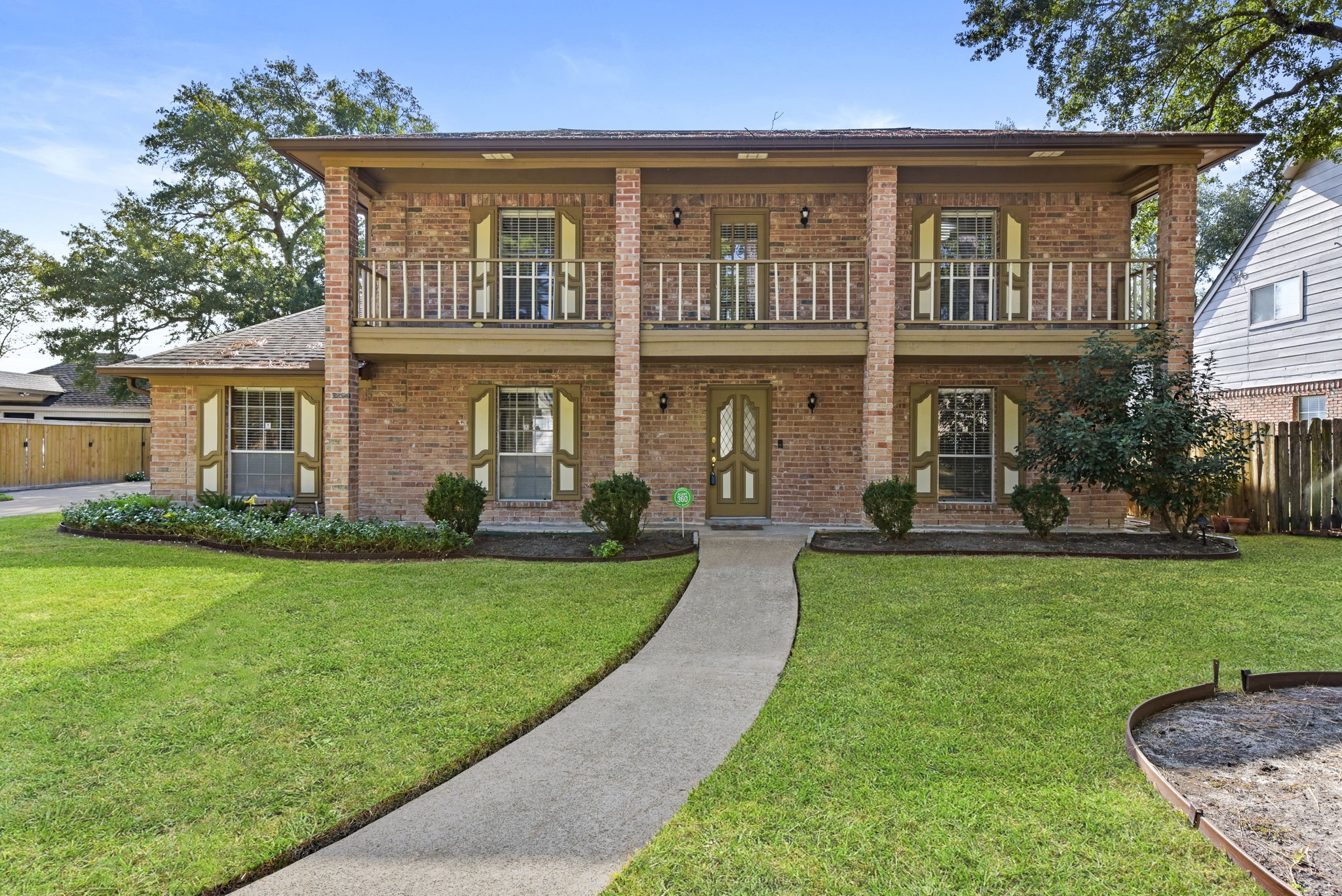 6507 Spring Leaf Drive Spring, TX 77379 - Photo 2 of 34 front view of a house with a yard