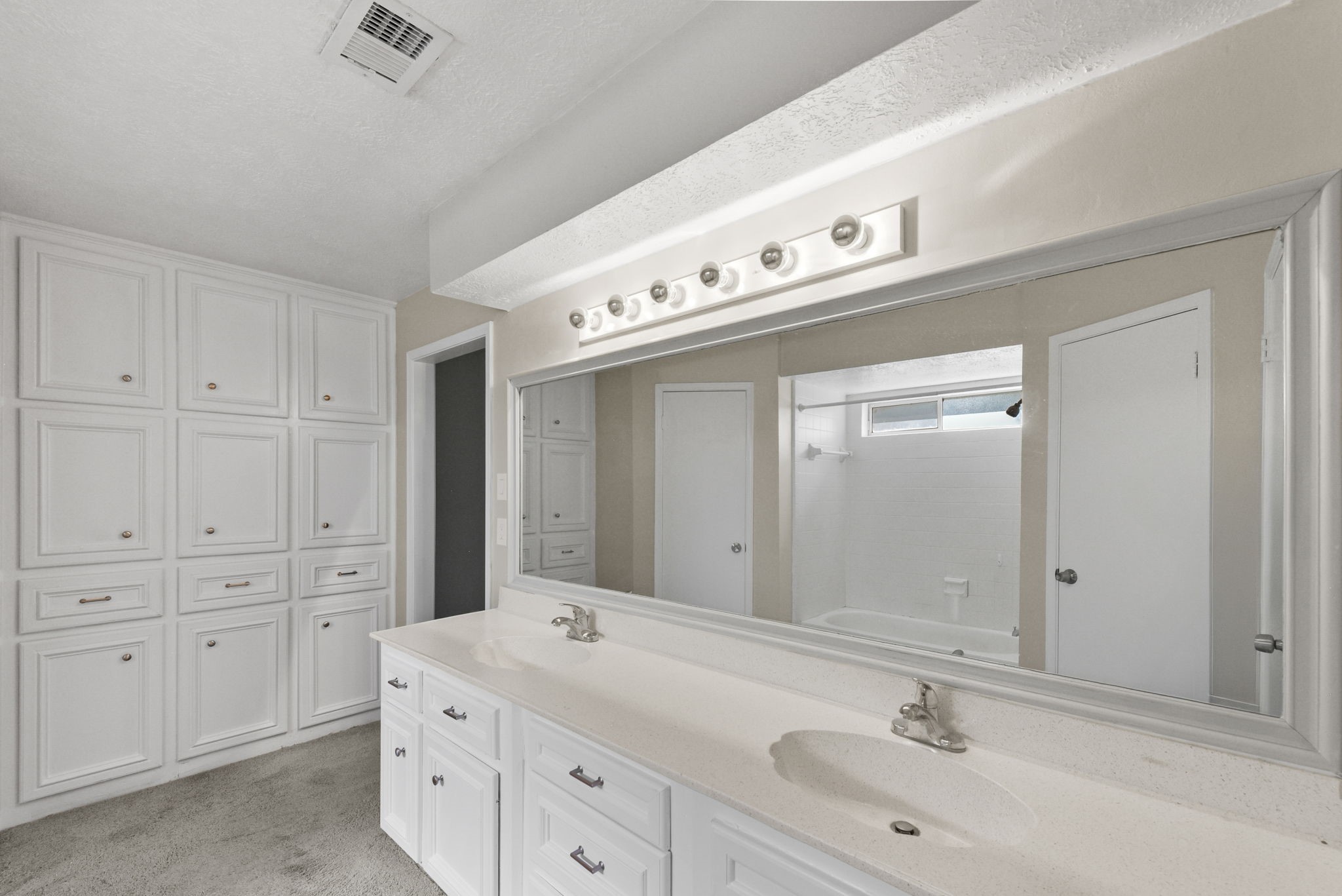 6507 Spring Leaf Drive Spring, TX 77379 - Photo 21 of 34 a bathroom with a sink and a mirror