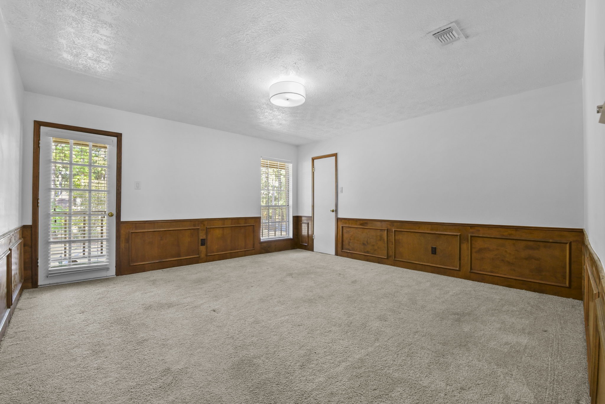 6507 Spring Leaf Drive Spring, TX 77379 - Photo 25 of 34 an empty room with windows