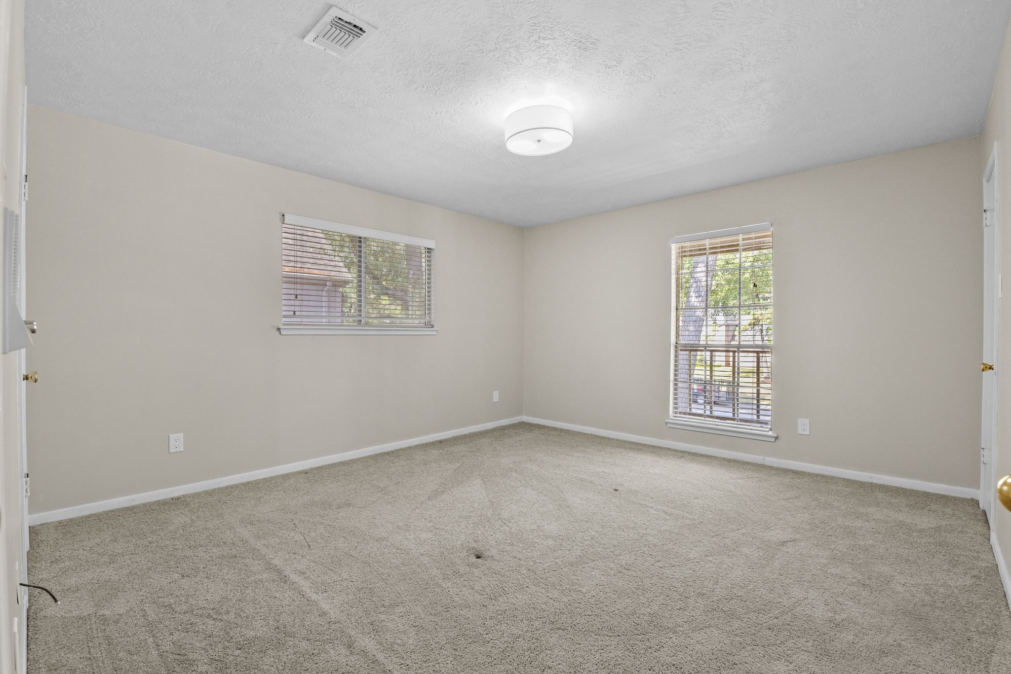 6507 Spring Leaf Drive Spring, TX 77379 - Photo 27 of 34 an empty room with windows
