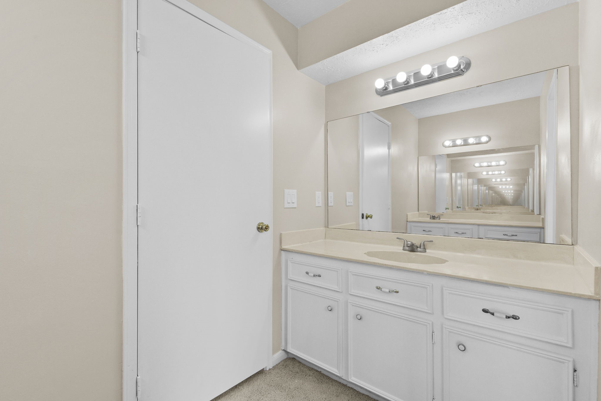 6507 Spring Leaf Drive Spring, TX 77379 - Photo 29 of 34 a bathroom with a sink and a mirror