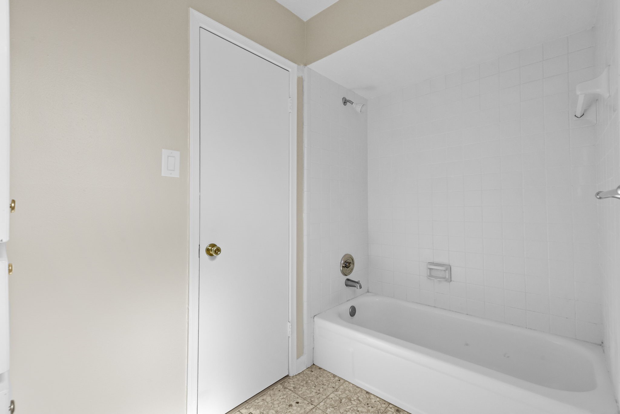 6507 Spring Leaf Drive Spring, TX 77379 - Photo 31 of 34 a bathroom with a bathtub and a shower