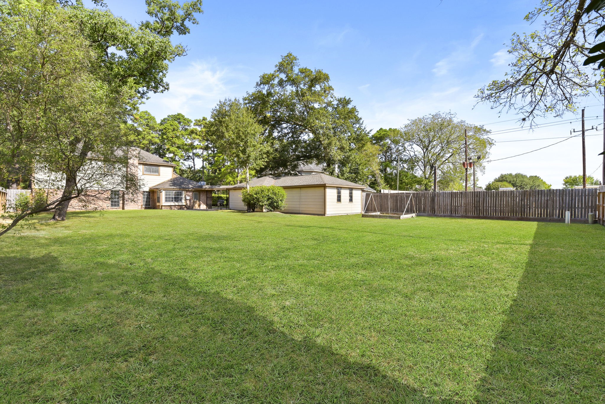 6507 Spring Leaf Drive Spring, TX 77379 - Photo 33 of 34 a view of a house with a big yard