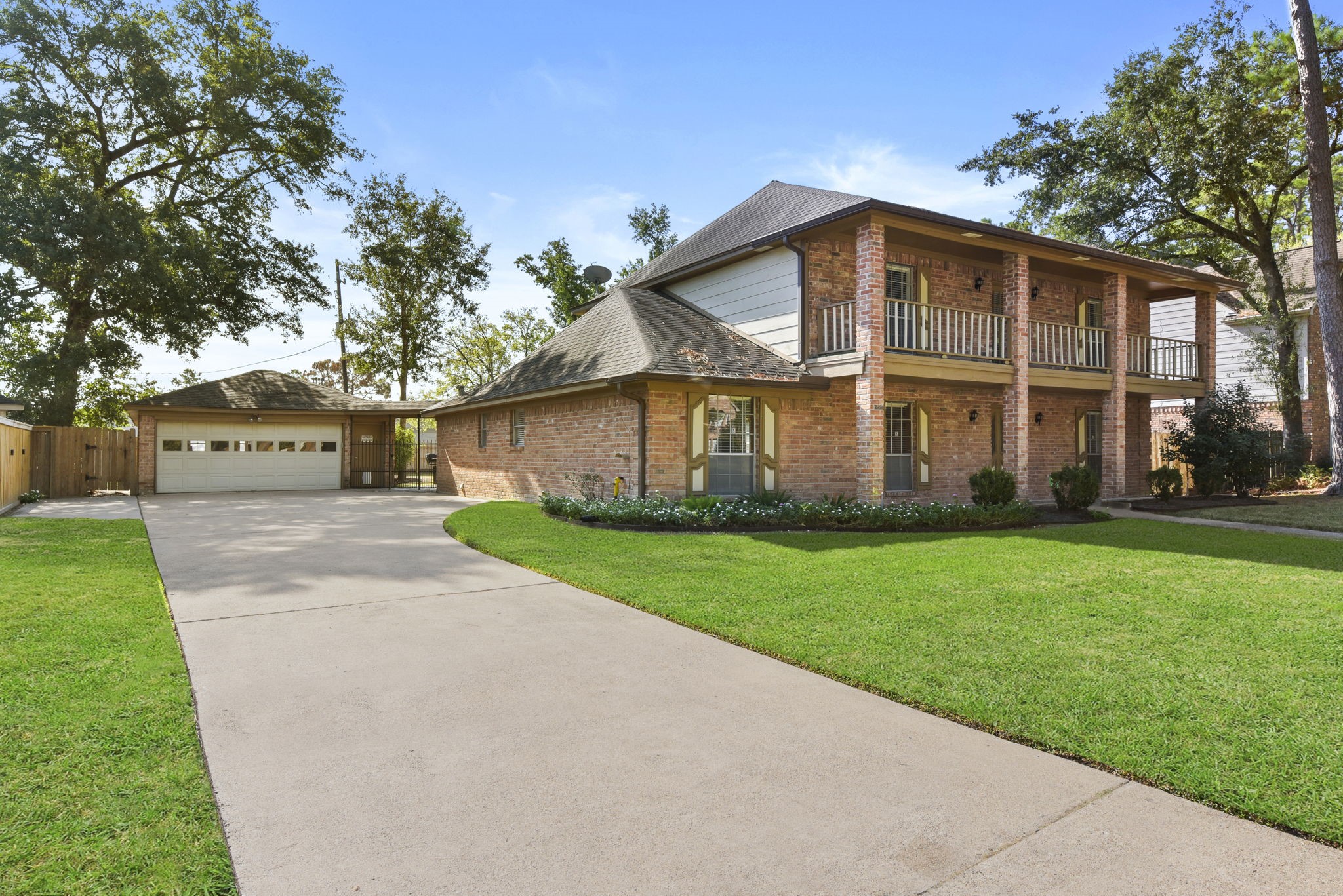 6507 Spring Leaf Drive Spring, TX 77379 - Photo 4 of 34 a front view of a house with a yard and trees