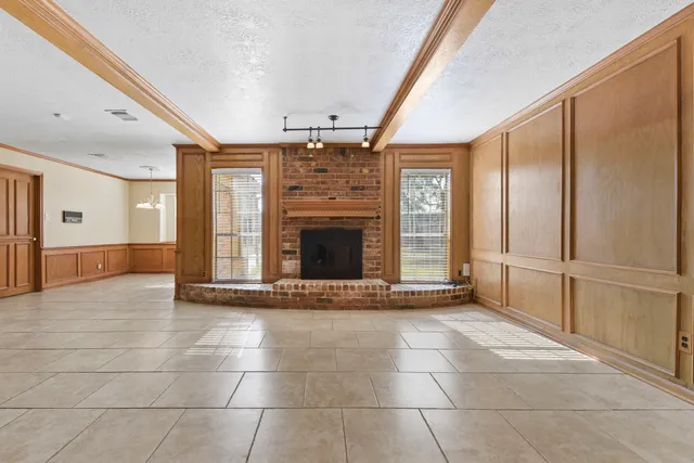 a view of a livingroom with a fireplace