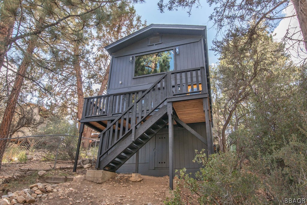 186 Riverside Avenue Sugarloaf, CA 92386 - Photo 1 of 34 a view of front door of house with a small yard