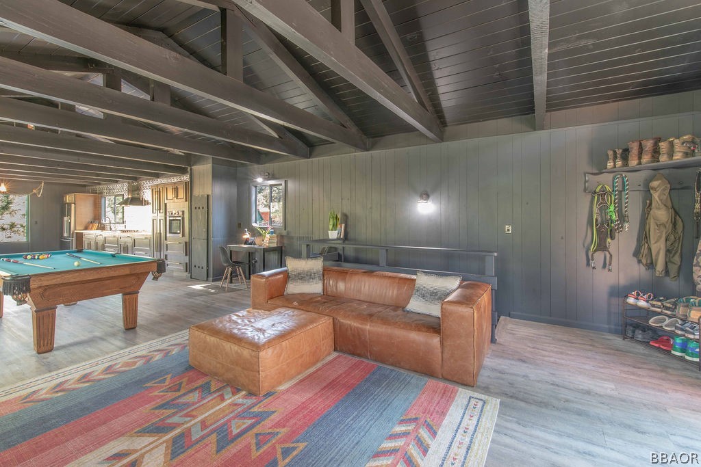 186 Riverside Avenue Sugarloaf, CA 92386 - Photo 7 of 34 a living room with furniture and wooden floor
