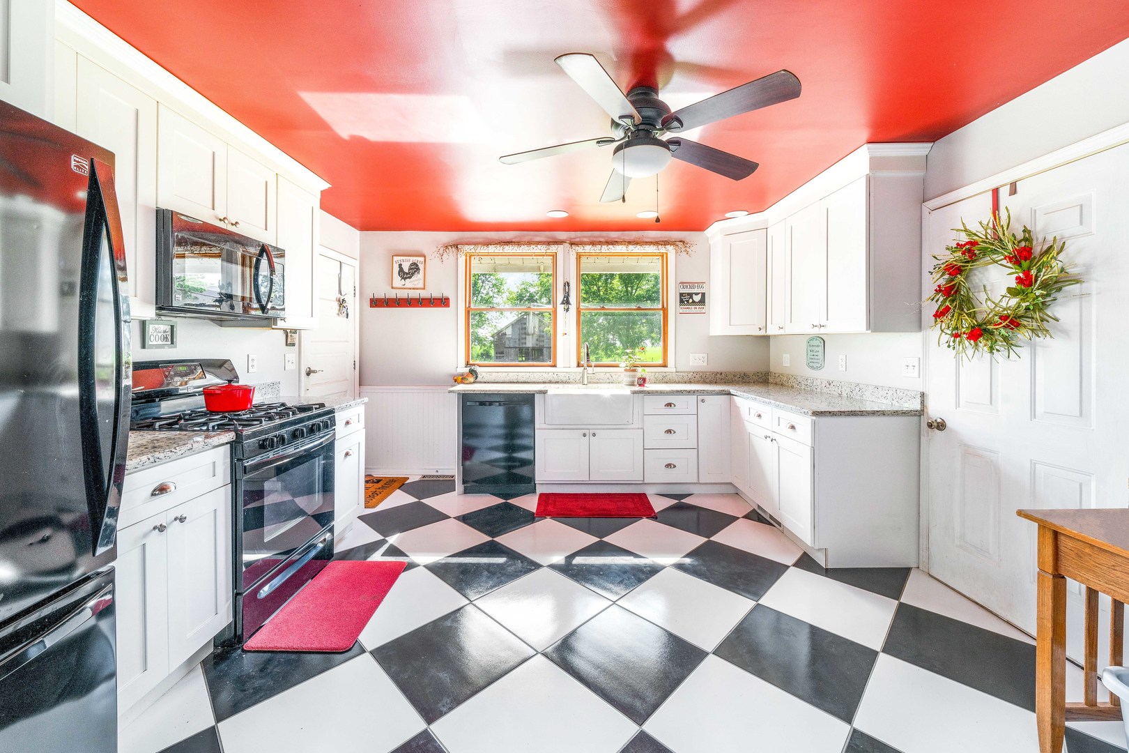 3700 Kane Road Leland, IL 60531 - Photo 2 of 30 a very nice looking open kitchen with stainless steel appliances cabinets and a table and chairs