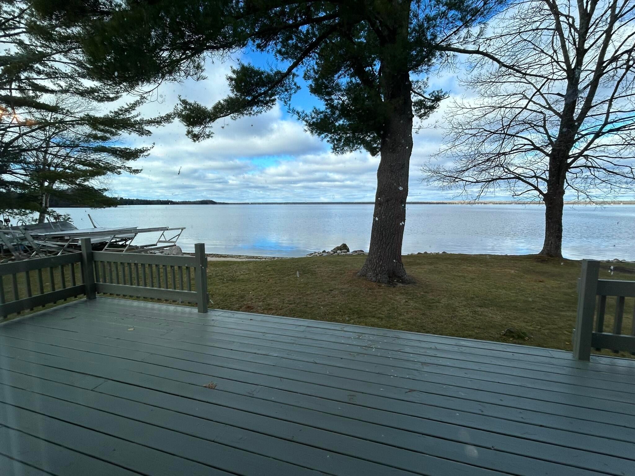 3084 West Old Place Road Moran, MI 49760 - Photo 26 of 61 Back Deck to Lake & Living Room View 1