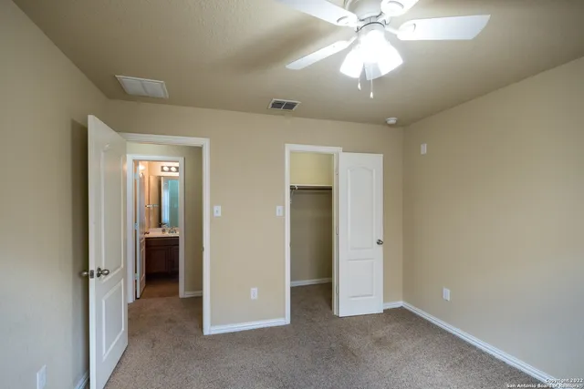 wooden floor in an empty room and a window