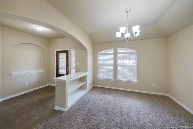 en view of an empty room with a window