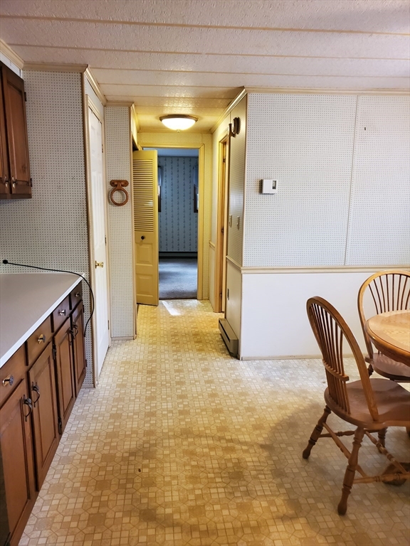 10 5th Street Brookfield, MA 01506 - Photo 15 of 17 a view of a hallway to a livingroom with furniture