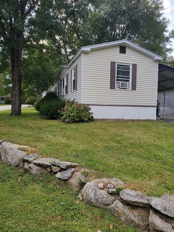 10 5th Street Brookfield, MA 01506 - Photo 17 of 17 a backyard of a house with barbeque oven
