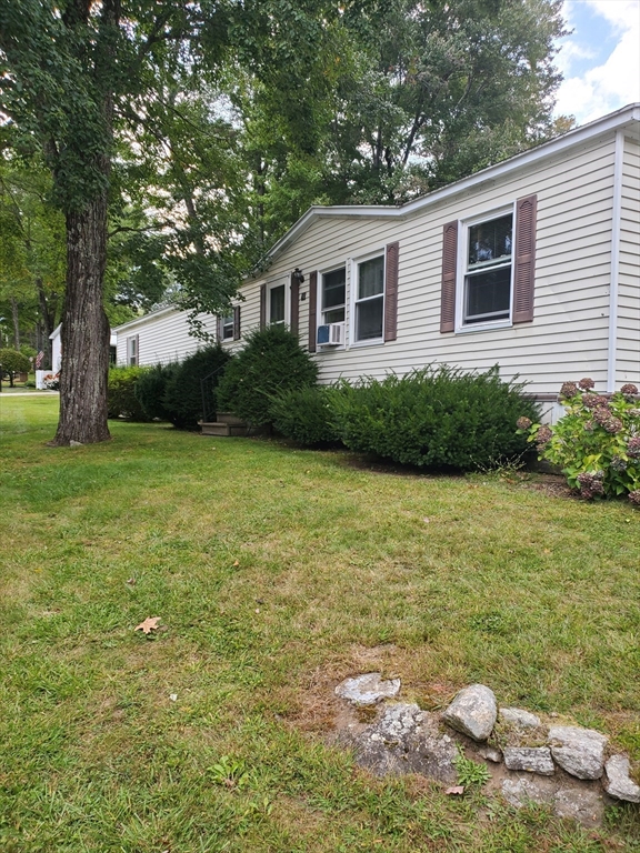 10 5th Street Brookfield, MA 01506 - Photo 2 of 17 a backyard of a house with lots of green space