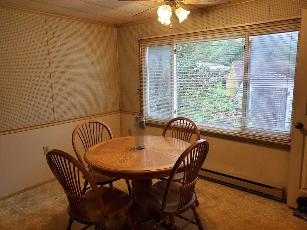 10 5th Street Brookfield, MA 01506 - Photo 5 of 17 a view of a dining room with furniture window and outside view