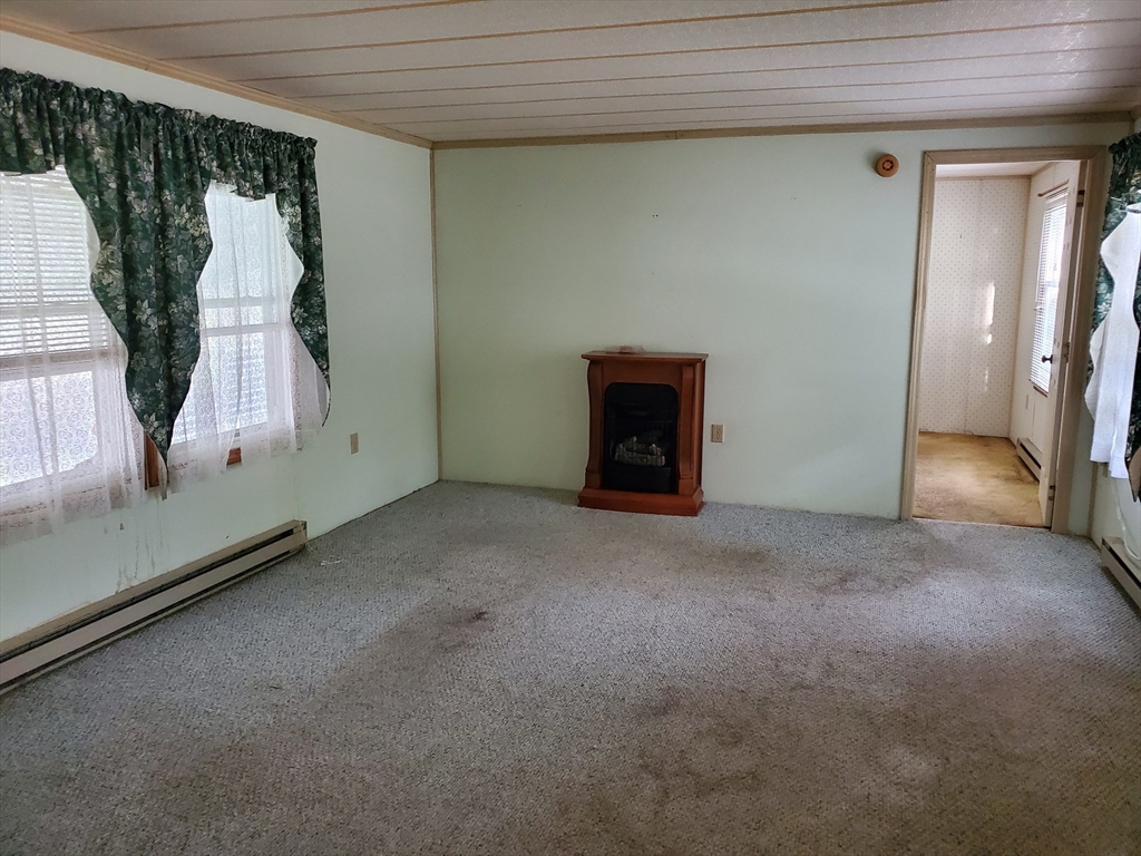 10 5th Street Brookfield, MA 01506 - Photo 7 of 17 a view of a livingroom with a staircase