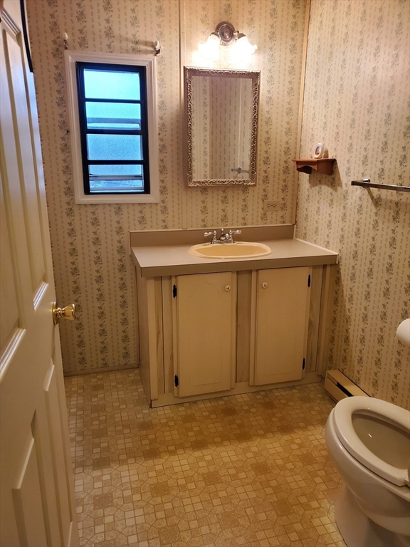 10 5th Street Brookfield, MA 01506 - Photo 8 of 17 a bathroom with a sink and a mirror