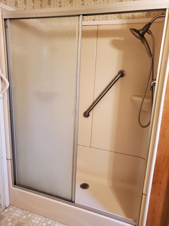 10 5th Street Brookfield, MA 01506 - Photo 10 of 17 a bathroom with a glass shower door