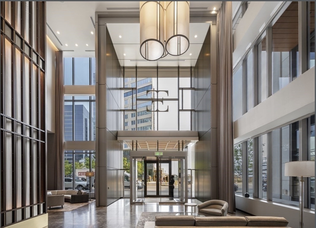 133 Seaport Boulevard, Unit 920 Boston, MA 02210 - Photo 26 of 28 a front view of a house with outdoor seating