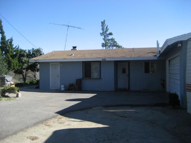 670 Ranger Road Fallbrook, CA 92028 - Photo 1 of 1 a front view of a house with a yard