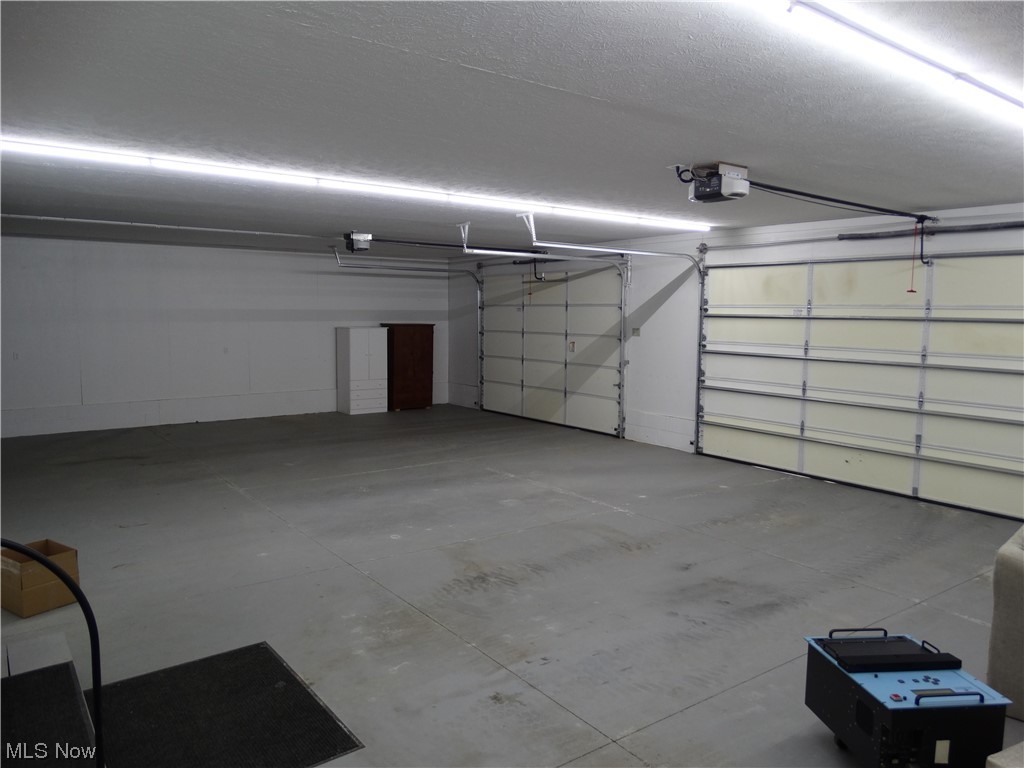 4100 Dayton Road Madison, OH 44057 - Photo 16 of 25 the 3 car garage with hot an cold water.