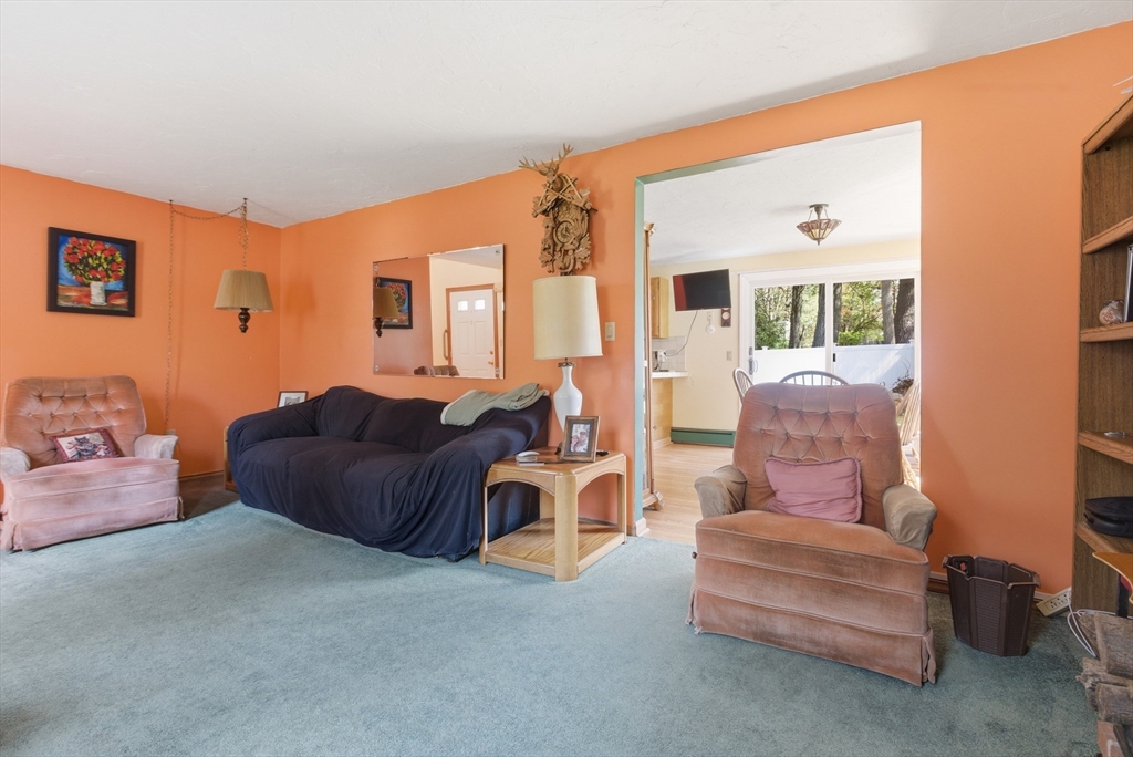 19 Mockingbird Lane Maynard, MA 01754 - Photo 3 of 34 a living room with furniture and a large window