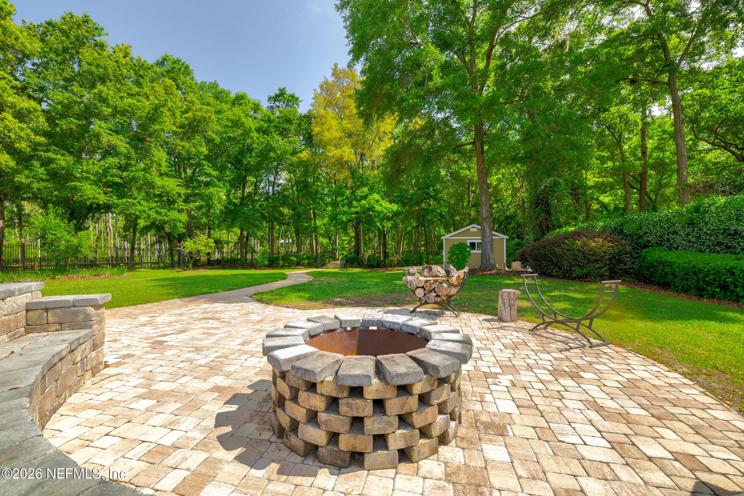3225 Bishop Estates Road St. Johns, FL 32259 - Photo 76 of 90 a view of a backyard with a garden and plants