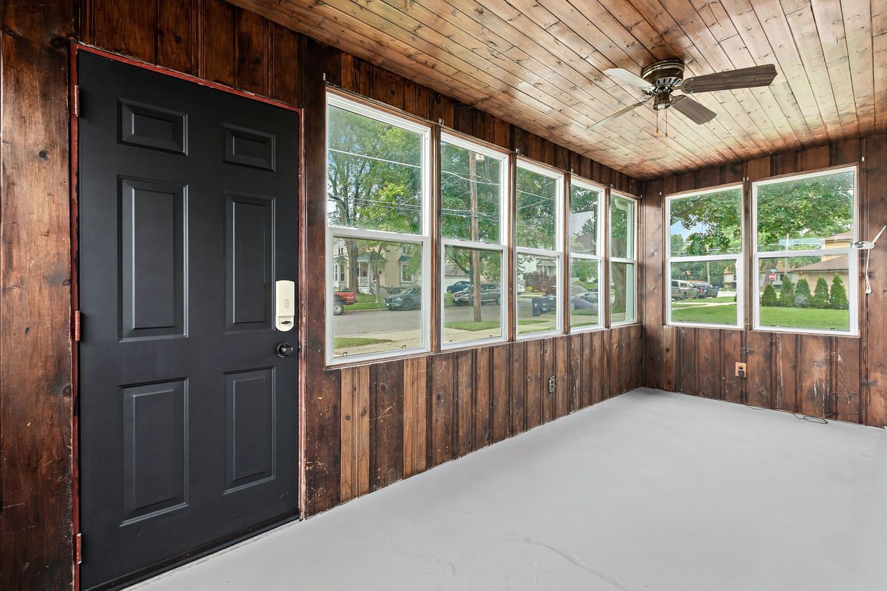 319 Wabash Street Elgin, IL 60123 - Photo 16 of 18 a view of a backyard with a large window